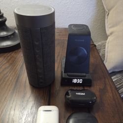Wireless Speaker. Two Working Head Phone Sets. One Air Pod Charger. Clock Charger For Phone, Head Phones, & Smart Watch 