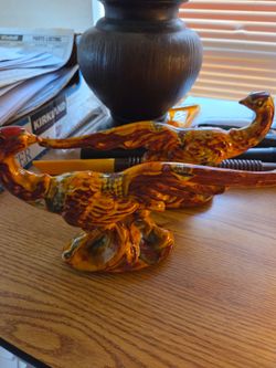 Vintage pheasant/ peacock statues