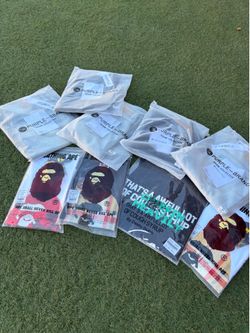 Bape t-shirts and purple jeans