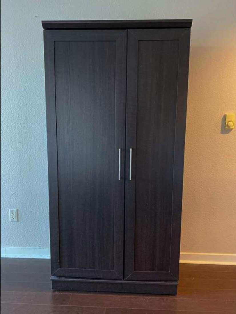 Dark wood wardrobe / armoire / storage cabinet