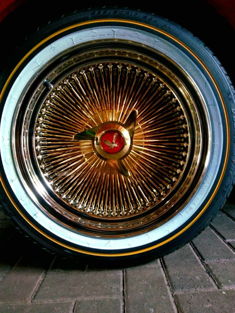 17" Gold spokes and Vogue Tires