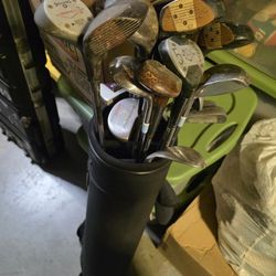 2 Bags Full of Golf Clubs. 20-30 Clubs