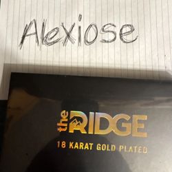 Sealed 18 Karat Gold Ridge Wallet 