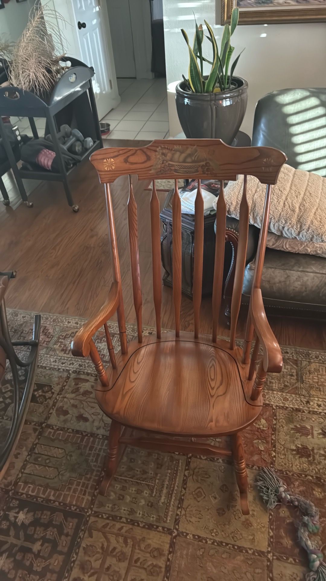 Hand carved oak rocking chair
