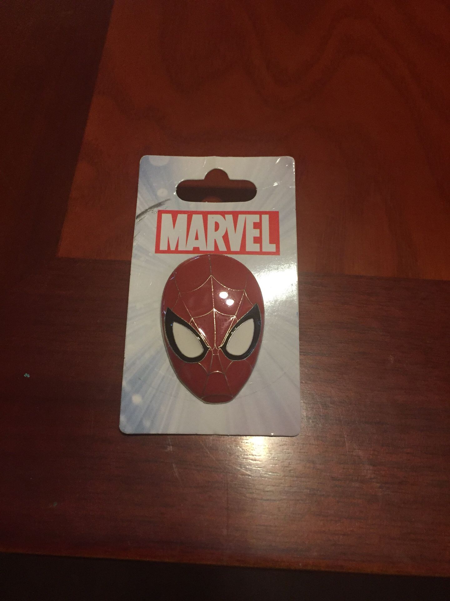 Brand new marvel Spiderman head pin from Disney world. One and a half inches tall