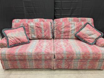 Traditional Red and Teal Upholstered Sofa with Patterned Cushions