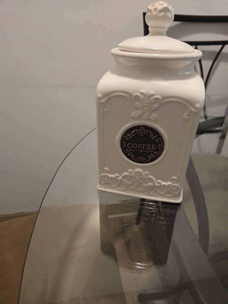 Ceramic coffee jar; NOTE: If it's posted; it's available.