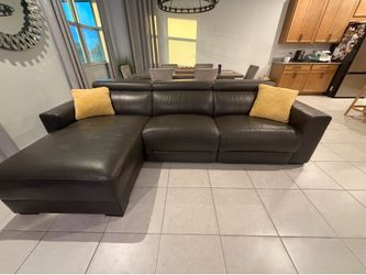 3 piece leather sectional sofa with 2 power recliners and articulating headrests