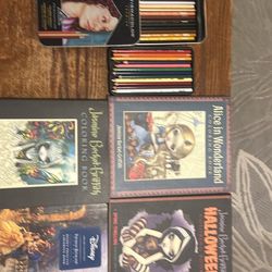 Four Coloring Books With Colored Pencils