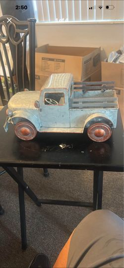 Vintage-style galvanized metal pickup truck