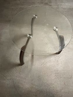 1 Round Tempered Glass End Table with Brown Trim Asking 20.00