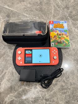Nintendo switch lite pink with one game bundle