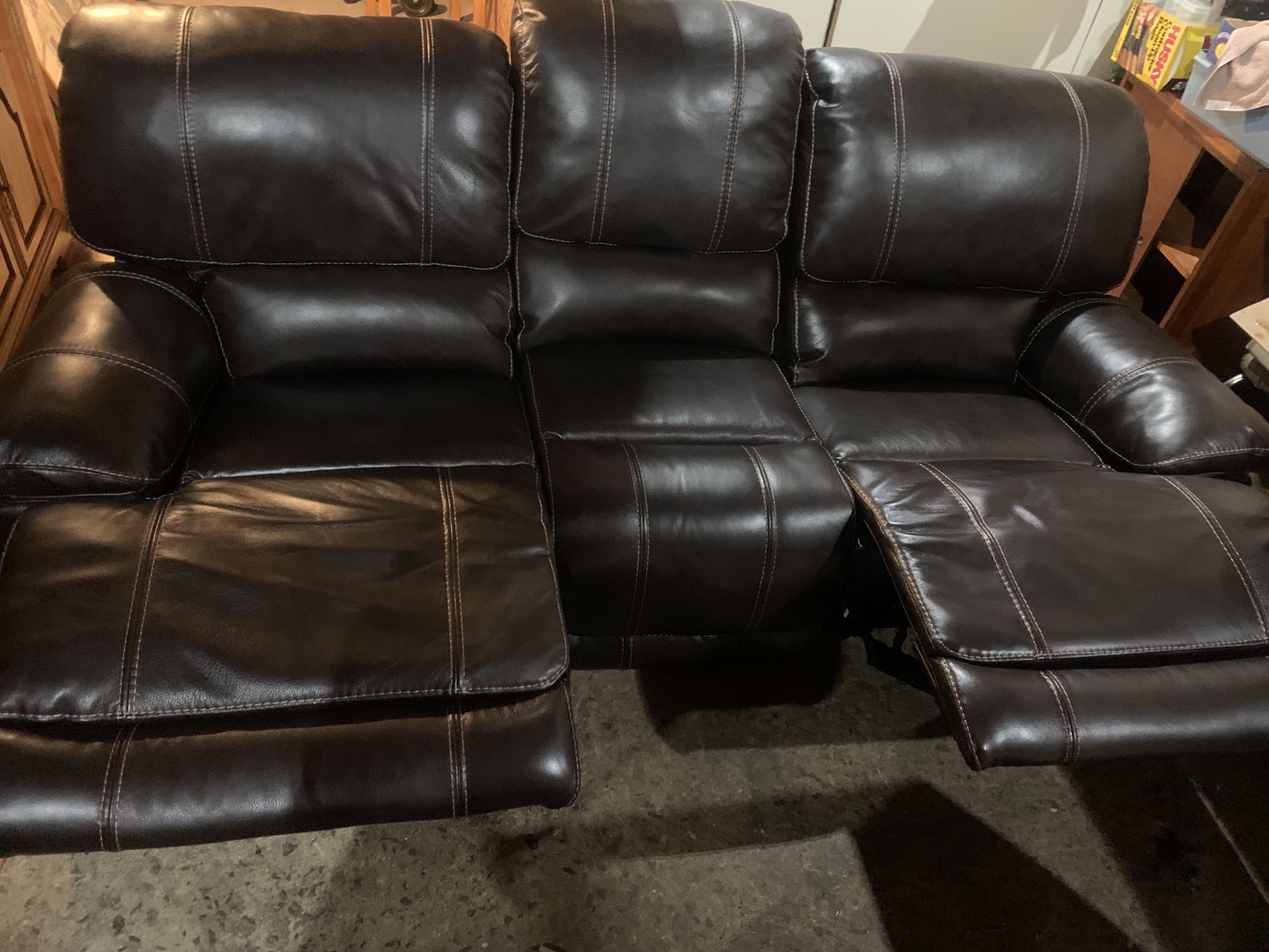 New, not used leather power reclining couch with USB