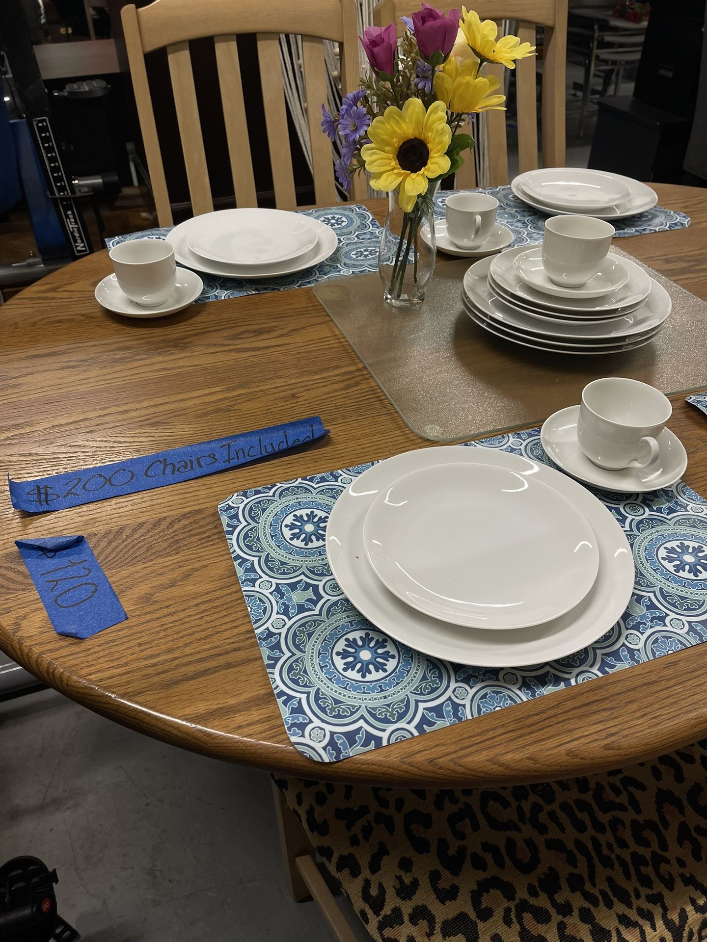 Light Wood Table With Bottom Metal Holder And Cheetah Print Light Wood Chair