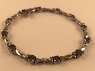 14k solid white gold purple bracelet grams: 8.3