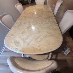 Dining table 6. Chairs.