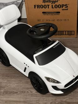 Toddlers push car, Maserati