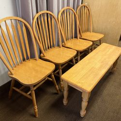 (4) Oak Arrow back Windsor Dining Chairs $15 each. Oak Dining Bench $20. All $80 