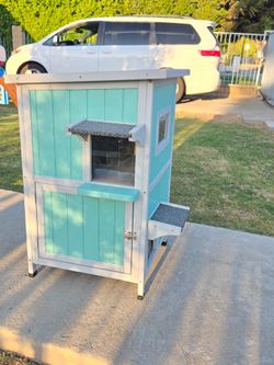 Double-layer wooden cat house