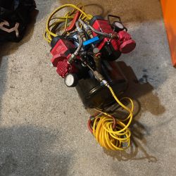 Twin 12 V 120 psi air compressors hooked up to a tank