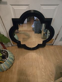 Black Modern Mirror..size 30 Inch Round..Good Condition!