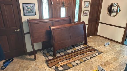 Queen size walnut sleigh bed frame