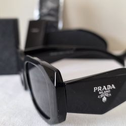 Prada Luxury/Designer Black Sunglasses.   Condition is New with paperwork and Case