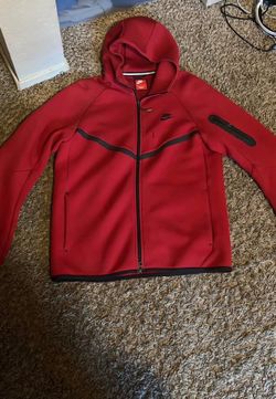 Red Nike tech fleece
