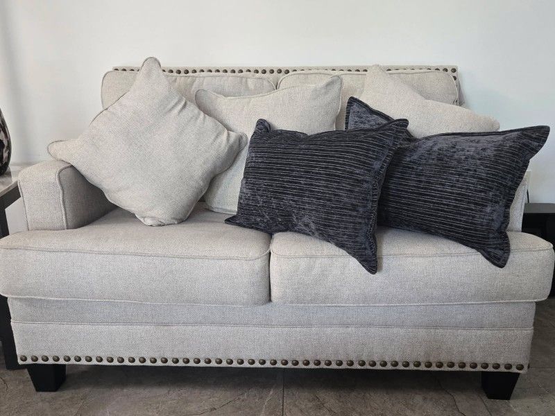 Sofa and loveseat. Beige/cream Color.