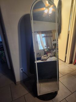 Mirror with inner shelves