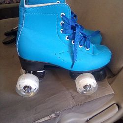 Brand New Roller Skates The Wheels Light Up !
