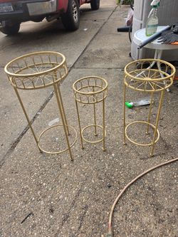 Price is firm.. three beautiful plant stands