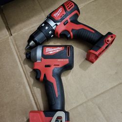 Milwaukee M18 18V Lithium-Ion Cordless 1/2 in. Drill Driver and M18 18V Lithium-Ion Brushless Cordless 1/4 in. Impact Driver.
