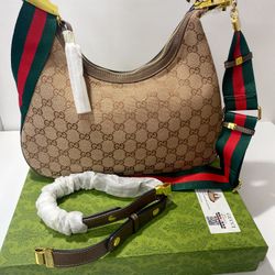 GUCCI ATTACHE $150.00