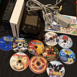 2 Nintendo Wii Console Bundles one white the other is black with massive games 