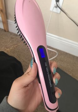 Pink hair brush straighter