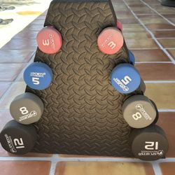 Neoprene Dumbells And Foam Romulus Stand
