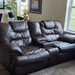 BROWN LEATHER TWO SEAT RECLINER. USED