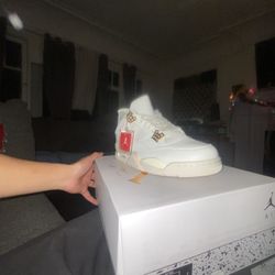 Jordan 4 Metallic Gold 