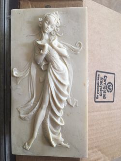 Oriental figurine looks like alabaster