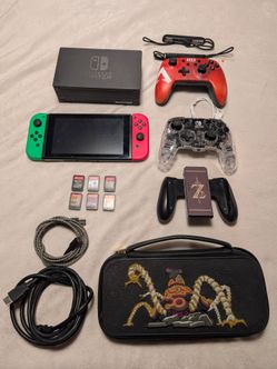 Switch 1 with 5 games and 3 controllers