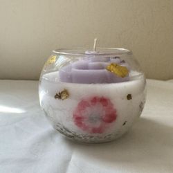 Pretty Candle With Lavendar Rose On Top.