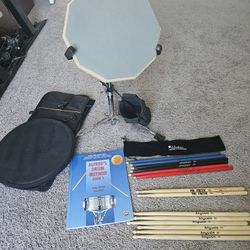 Anyuxin drum practice set with 7 pairs of 5A and 5AN drum sticks and Alfred's drum method book