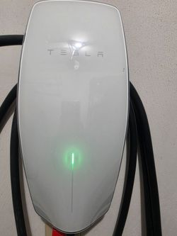 Tesla wall charging station with EV converter