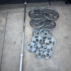 Olympic weights set 255lbs total plus 7ft 45lbs bar
