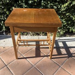 Amazing antique wooden swivel table