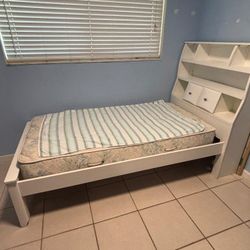 Twin Sleigh Bed with Bookshelf Header and Nightstand