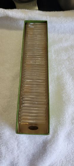 Assorted Lincoln Wheat Cents and Memorial Pennies in Plastic cases.