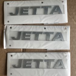 Jetta Hatch Emblem - Volkswagen (17A-853-687-2ZZ)