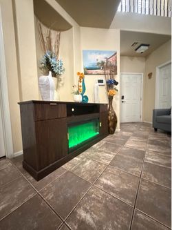 Beautiful fireplace /tv stand with 5 colors of flames 70” inch long
